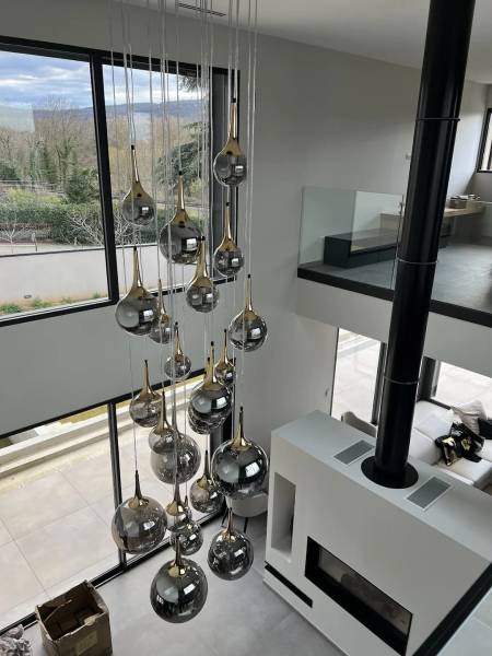 Réalisation de suspensions pour une maison d'architecte haut plafond Lyon