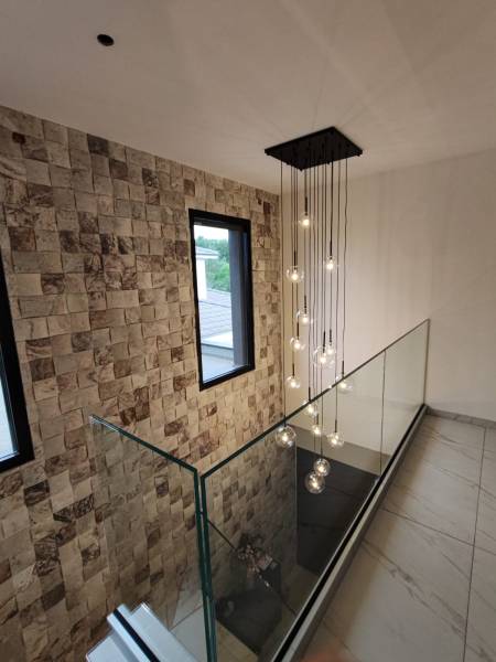 Suspension sur mesure pour grande hauteur sous plafond – Projet près de Lyon Suspension sur mesure pour grande hauteur sous plafond – Projet près de Lyon